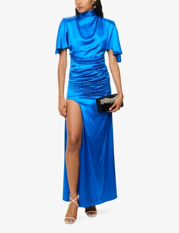 Designer blue silk dress featured at Selfridges